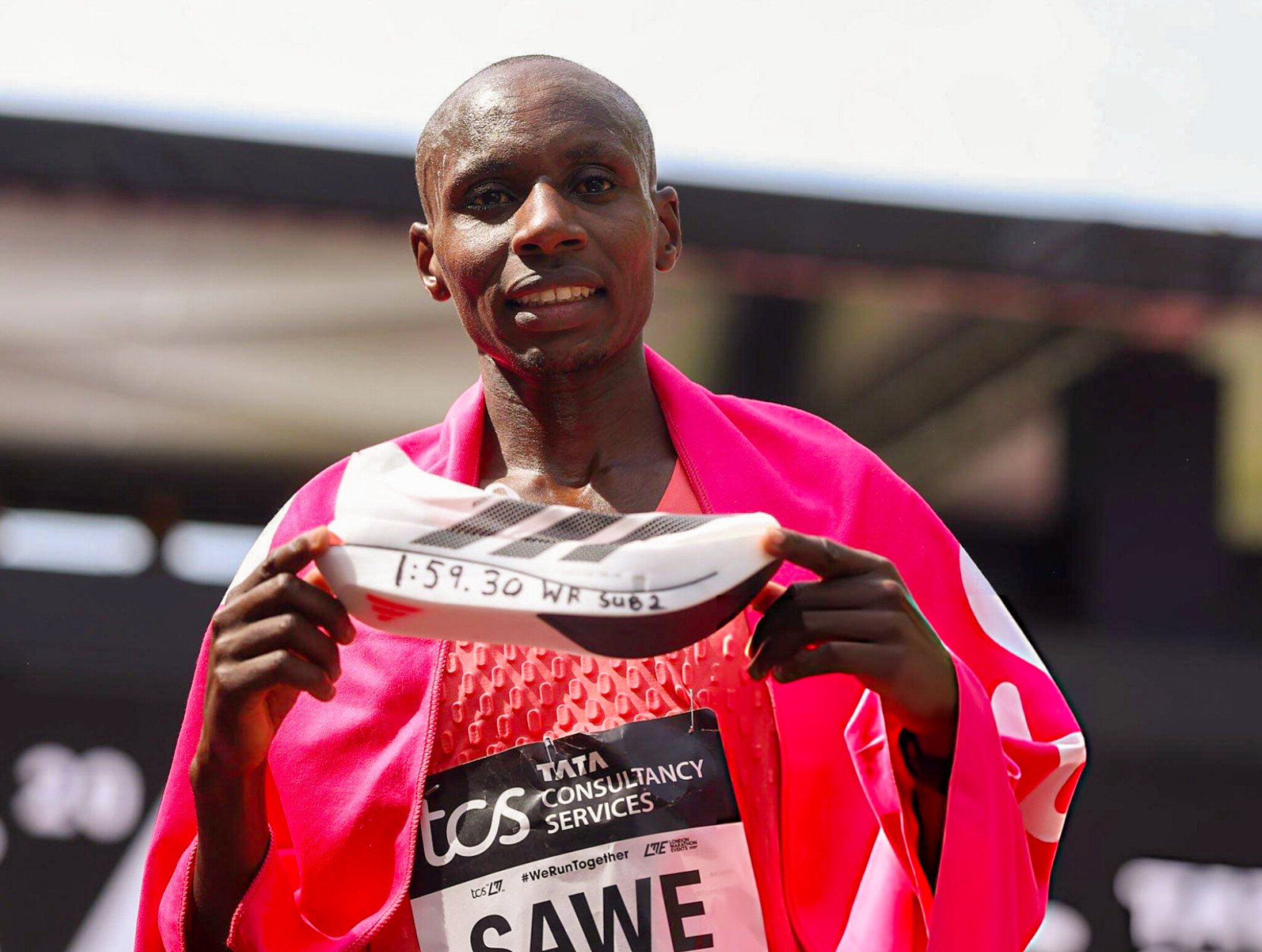 Kenya’s Sawe makes history with first official sub-two marathon run